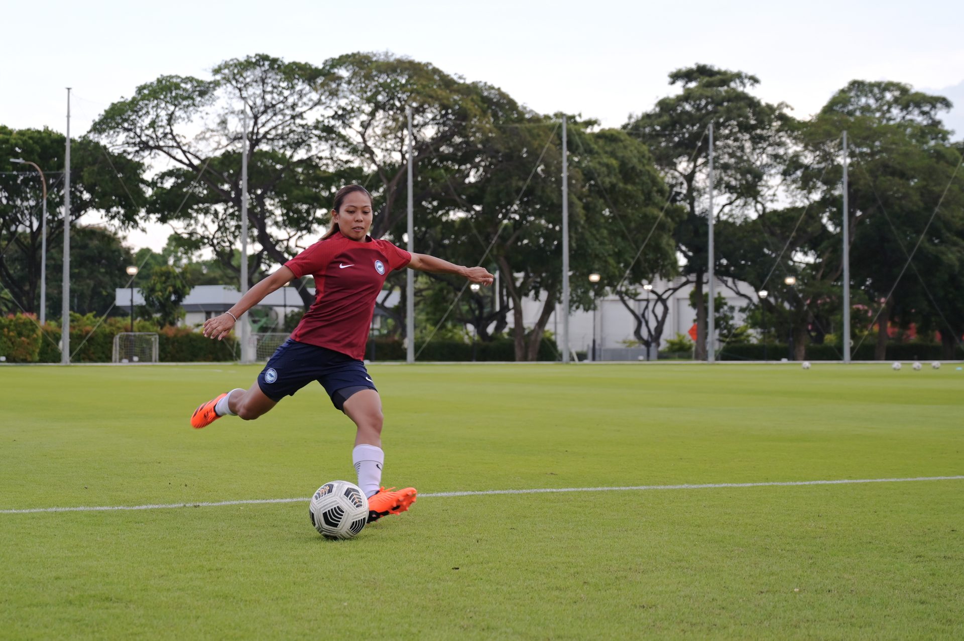 Sports equipment, Ball game, Sky, Shorts, Plant, Football, Soccer, Tree, Player