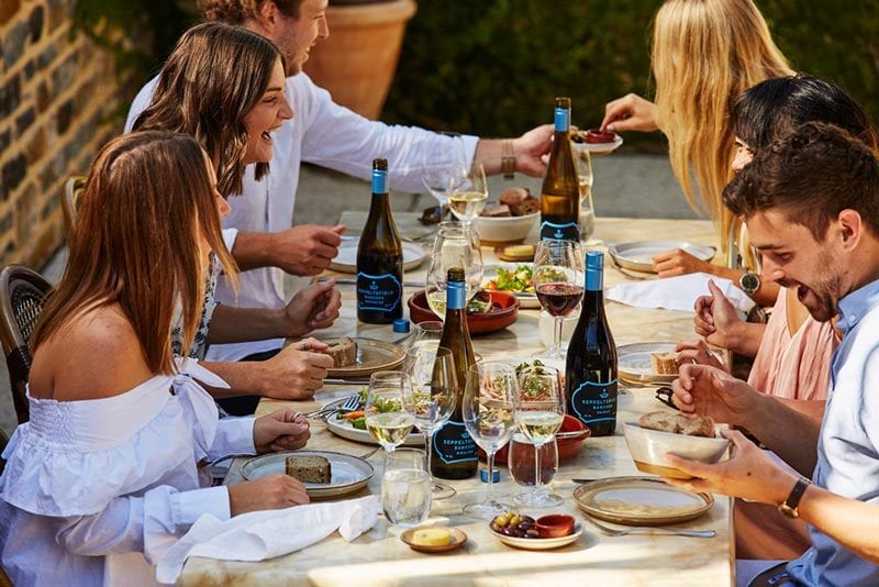 Wine glass, Alcoholic beverage, Food, Table, Tableware, Bottle, Sharing, Interaction, Community, Drink